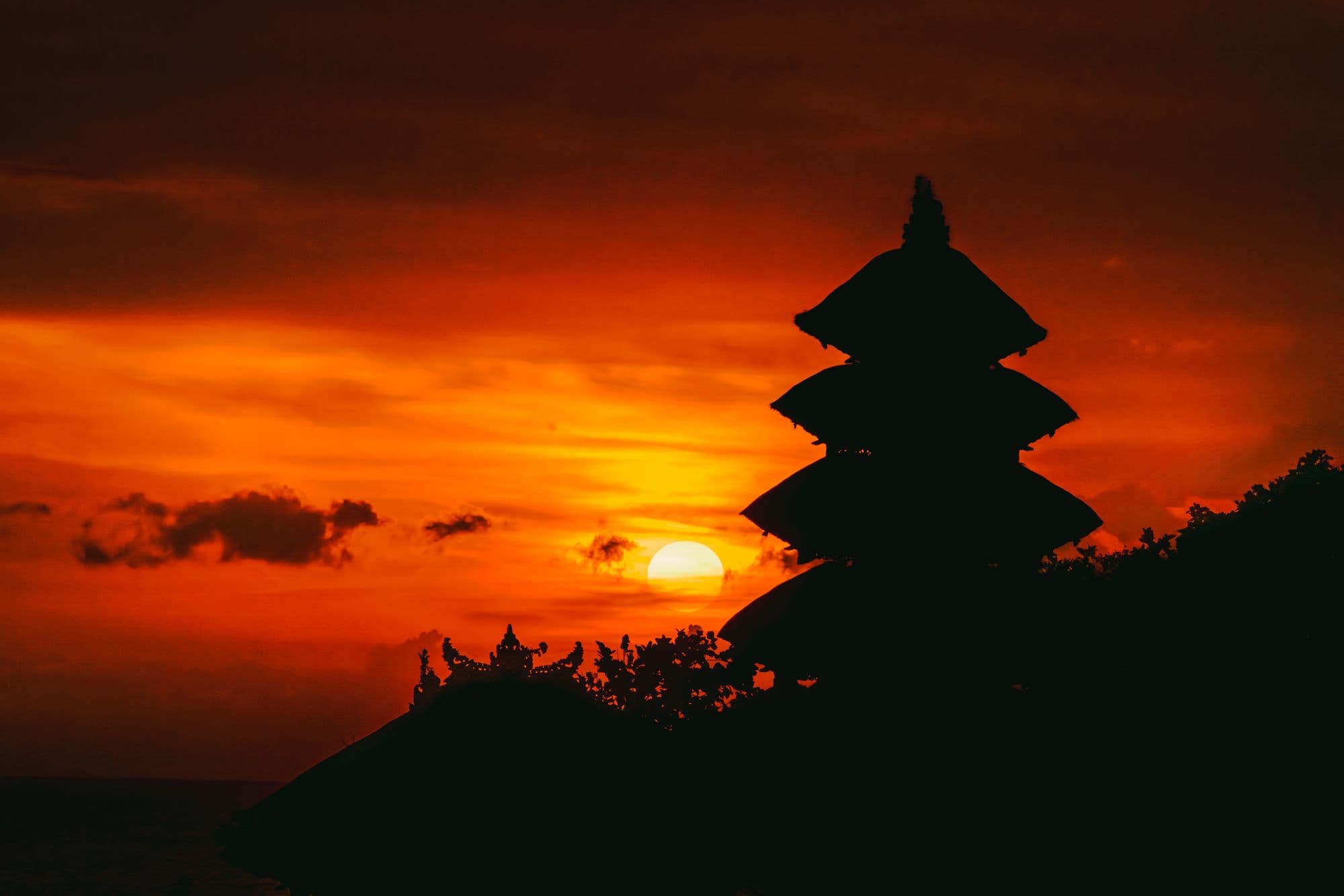 Temple silhouette against the setting sun
